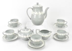 A 1950s Wedgwood Etruria/Barlaston Embossed Queensware coffee set, comprising a teapot, lidded sugar