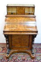 A Victorian burr walnut piano top davenport, third quarter 19th century, pierced brass gallery above