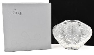 A Lalique 'Mahe Clair' clear and frosted glass vase, of tapered form with relief foliage,