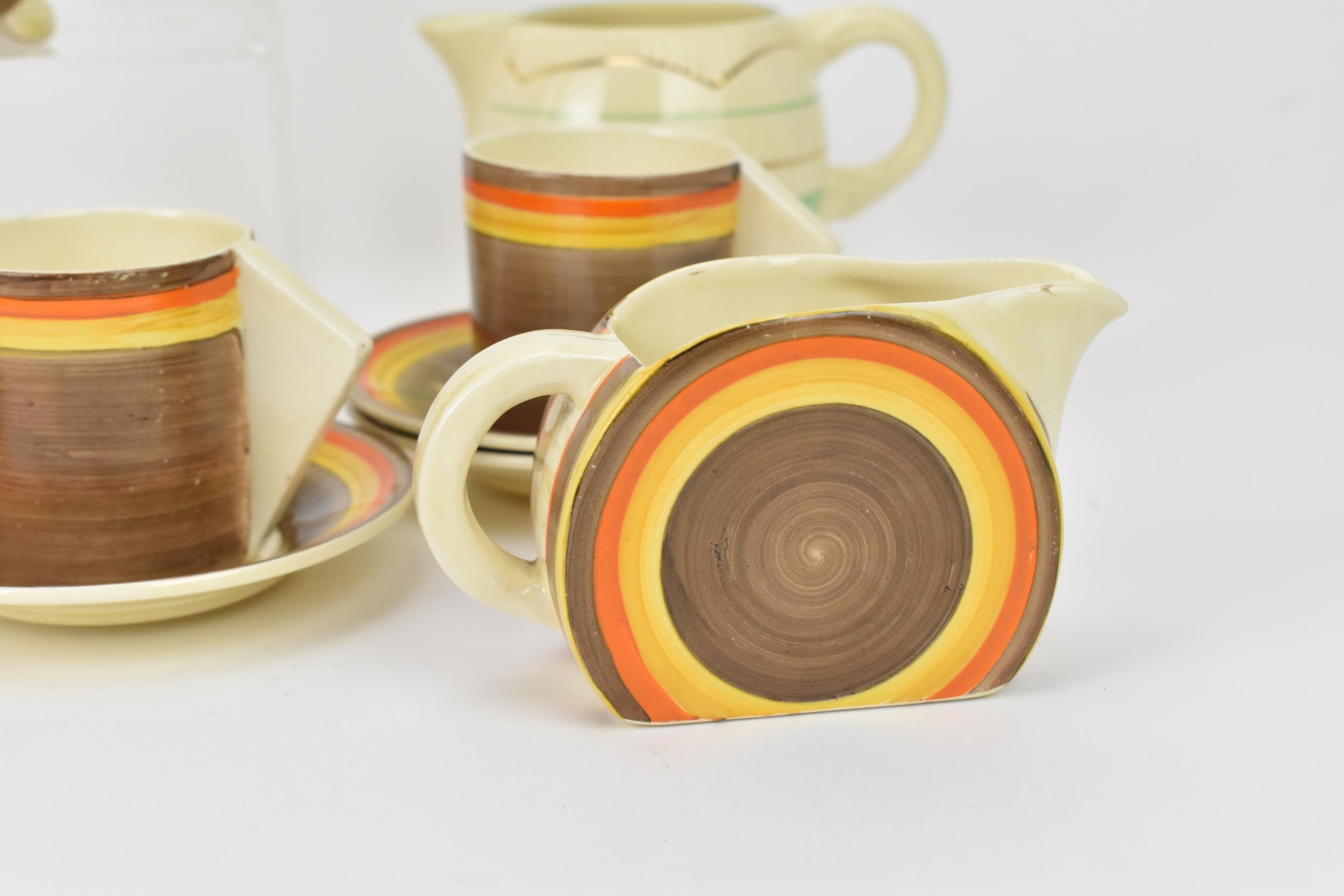 A 1930s Clarice Cliff Newport Pottery Bizarre pattern coffee set in the 'Liberty Stripe' pattern, - Image 6 of 11