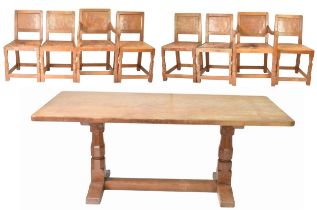 Robert 'Mouseman' Thompson (1876-1955) An oak refectory type dining table and six chairs, circa