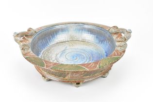 A large salt glazed stoneware basin by Richard Dewar, of circular form with twin handles either