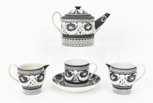 A Wedgwood black basalt part tea set, late 18th/early 19th century, comprising a teapot, two milk