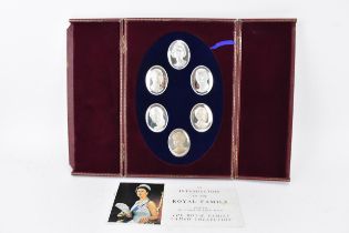 A cased set of six hallmarked silver Royal Family Cameo Collection medallions by John Pinches, in