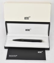 A Mont Blanc Starwalker ballpoint pen, Ultra Black model, with original box and service guide