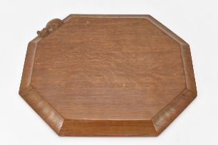 Robert 'Mouseman' Thompson (1876-1955) An adzed oak breadboard, circa 1984, extended octagonal
