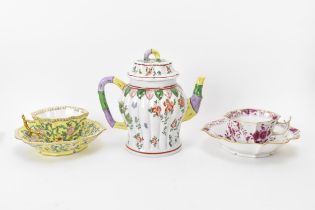 A small collection of porcelain to include a Dresden teapot in the Chinese style, the handle and