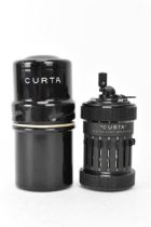 A Curta hand cranked mechanical calculator, Type I, sometimes known as the pepper-grinder, with