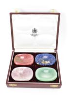 A set of mid 20th century Asprey & Co carved semi precious stone salt cellars, all of rounded