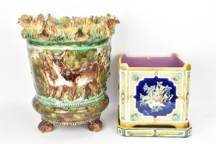 A large Thomas Forrester majolica jardinière decorated with deer's, together with a majolica planter