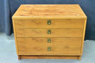 A mid 20th century yew veneer chest of drawers by Archie Shine and Robert Heritage for Heals of