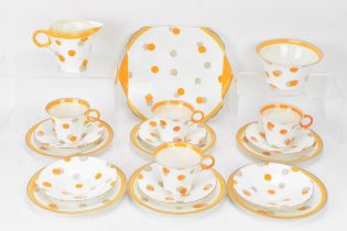 An Art Deco Shelley orange polka dot pattern part tea service, Regent shape, circa 1932-4,