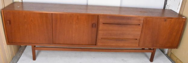 A Nils Jonnson for Troeds, mid 20th century Swedish teak sideboard, having four drawers flanked by a