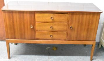A 1950s Gordon Russell for Heal's of London walnut round cornered sideboard, of three long drawers