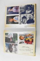 A Doctor Who album of autographs on photos, signed by several cast members to include Mark