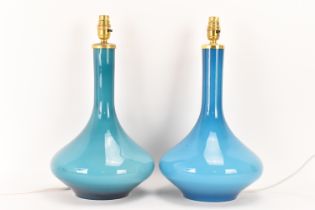 A large pair of vintage turquoise blue cased glass Holmegaard style table lamps, retailed by Illums