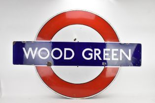 A London Transport Underground enamel target/bullseye sign for Wood Green, pre-war design with black