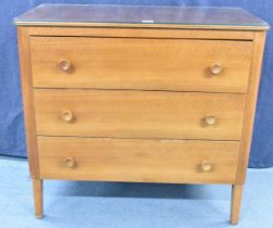 A 1950s Gordon Russell for Heal's of London walnut round cornered chest, of three long drawers