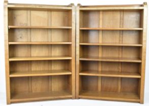 Robert 'Mouseman' Thompson (1876-1955) A matched pair of oak open bookcases, circa 1978, raised