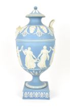 A large Wedgwood blue jasperware lidded urn in the 'Dancing Hours design', the Classical maidens