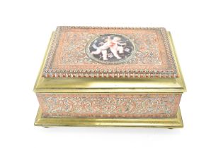 A late 19th century French copper and gilt metal jewellery casket, the hinged lid having a painted