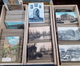 A large quantity of mainly early to mid 20th century tourist postcards, some franked with written