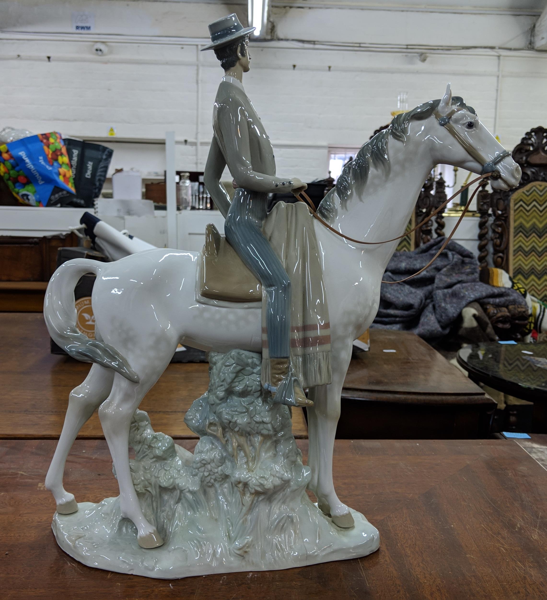 A Lladro figure of an elegant man in smart dress on horseback, Location: - Image 5 of 12