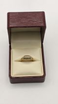 An 18ct gold and five stone diamond ring, 2.5g Location: CAB5