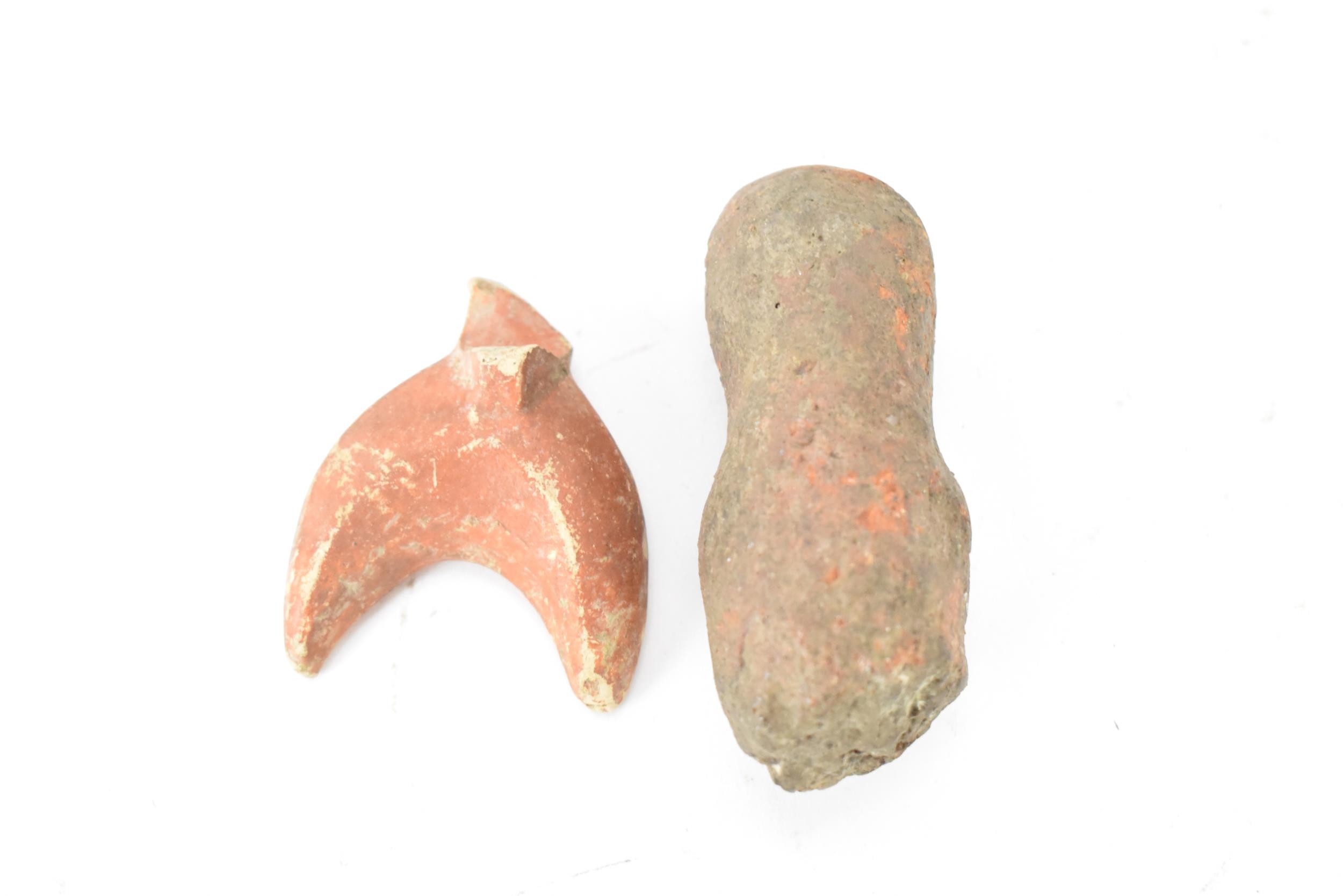 A collection of Roman pottery to include two terracotta oil lamps, a pot, a crescent shaped handle - Image 3 of 8