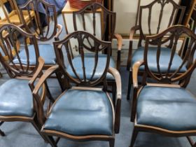 Set of six mahogany shield back carved dining chairs with leather upholstered drop in seats,