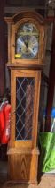 A modern oak cased grandmother longcase clock with leaded glazed aperture gilt face with silvered