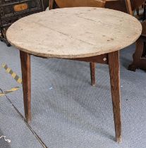 A 19th century pine circular topped cricket table having three tapering legs 72cm h x 81.5cm w