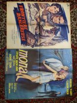 Seven vintage French film posters folded, to include Mona - l'etoil sans nom, Frontiere