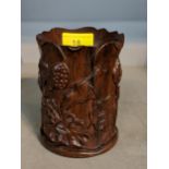 A 20th century Chinese carved hardwood brush pot decorated with lilies, Location: