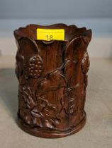 A 20th century Chinese carved hardwood brush pot decorated with lilies, Location: