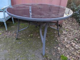 A modern grey coloured metal glass topped table, Location: DH