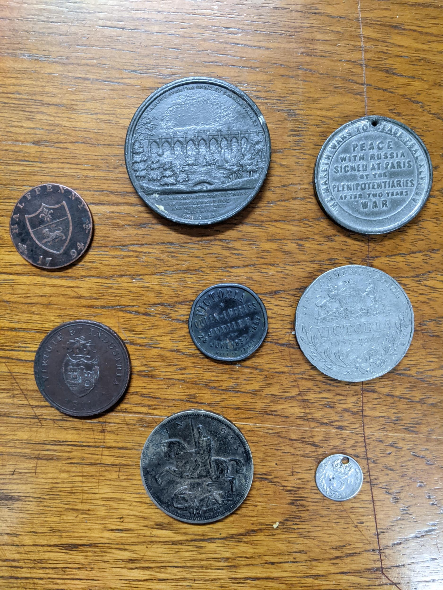 A group of 18th and 19th century tokens, commemorative medals and later coins to include a 1794 Duke