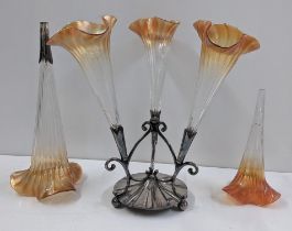 An Art Nouveau silver plated three branch epergne, with spare flute, A/F central branch broken