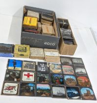 A quantity of photographic and cartoon slides to include monochrome photographic slides of ships and