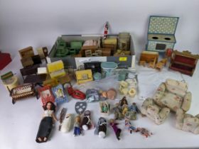 A quantity of vintage, wooden, plastic, fabric and metal dolls house furnishings and dolls, to