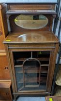 An Edwardian inlaid mahogany display cabinet with extended mirrored back with single shelf, glazed