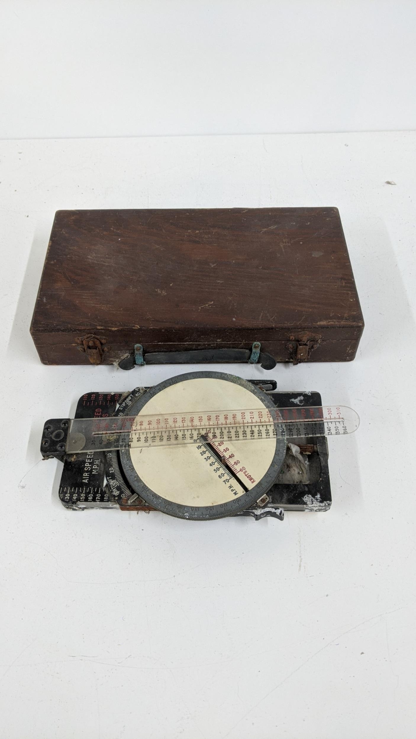 An early 20th century course and speed calculator with box, Location: - Image 2 of 8