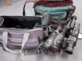 A Panasonic AG-EZ1E camcorder with accessories and case and a Sony Video Hi-8 handycam with