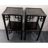 A pair of reproduction Japanned black lacquered two tier occasional tables having painted top and