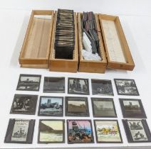 A selection of photographic slides and cartoon slides to include monochrome photographic pictures of