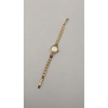 A mid 20th century 9ct gold ladies watch, 7.4g Location: CAB6