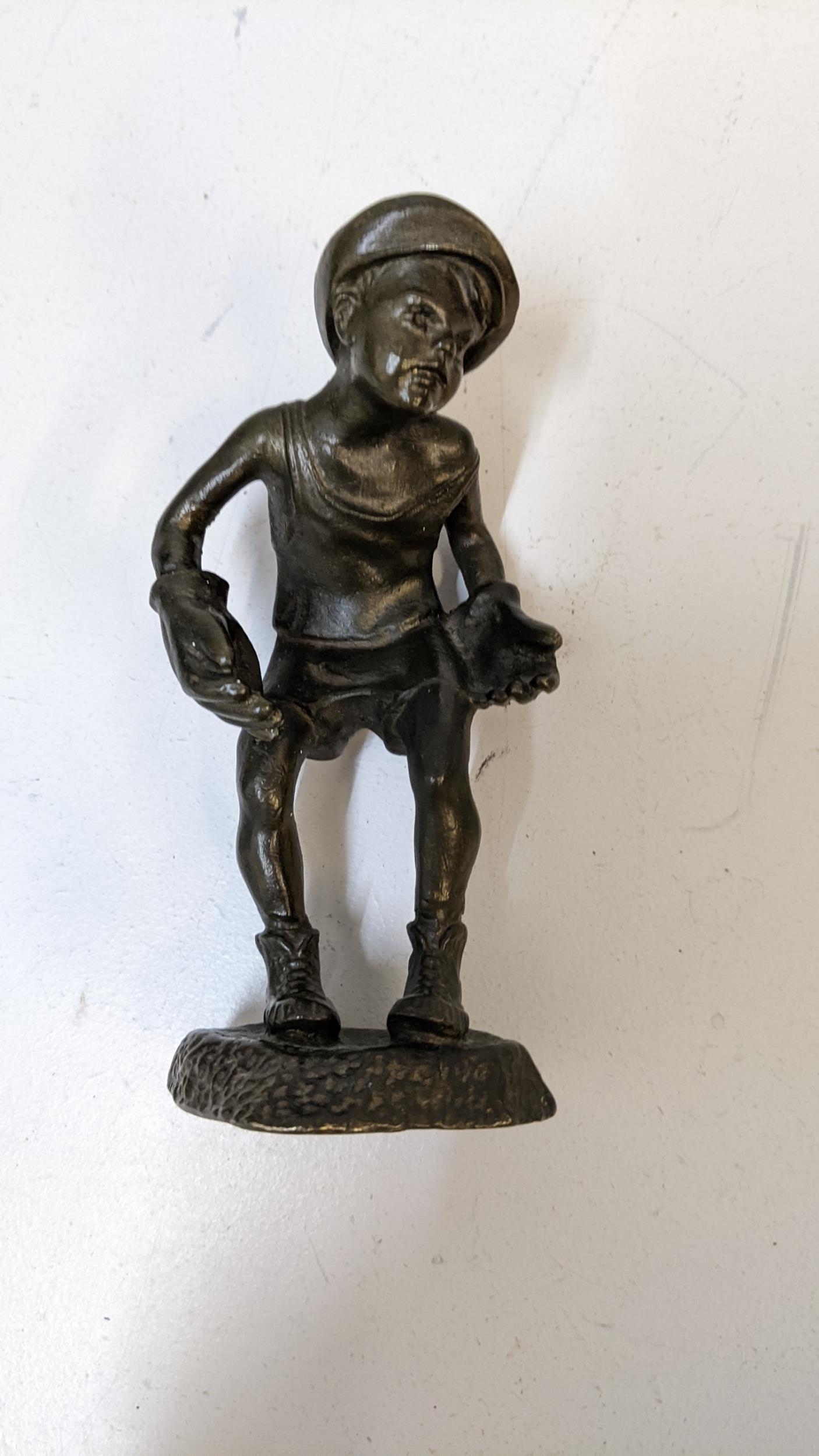 A 1930's cast bronze figure of a boy wearing a cap and oversized gloves, stamped H M Mop, 13cm h - Image 2 of 2