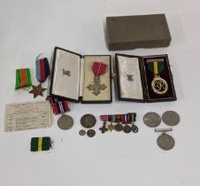 World War II medals to include an OBE medal, a Territorial World War II medal and others, along with