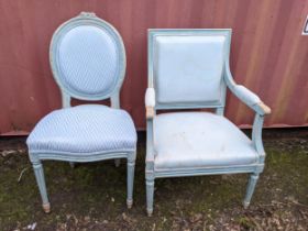Two reproduction blue painted French chairs to include an armchair with scrolled arms and reeded