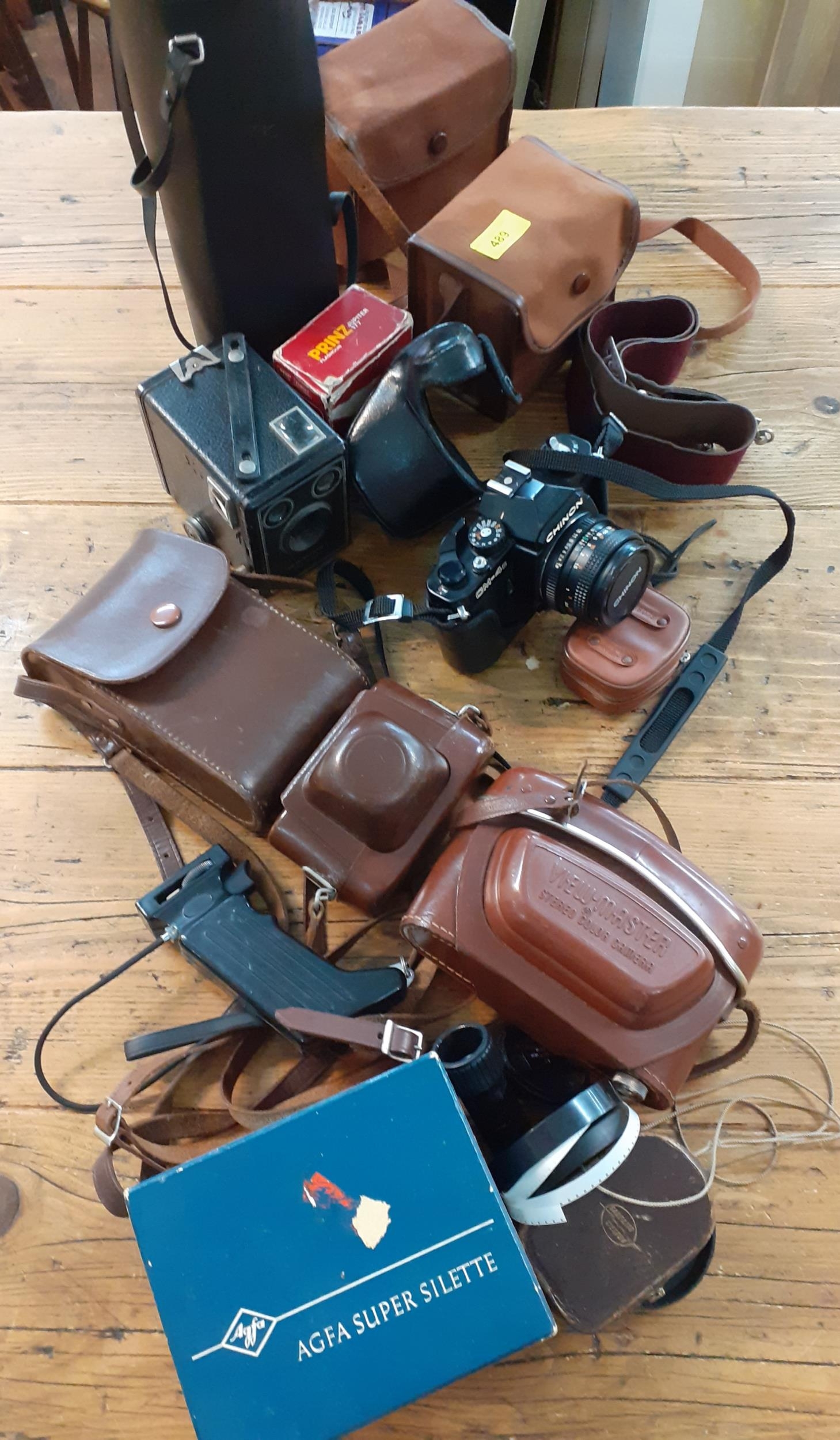 A quantity of vintage cameras and accessories to include a Chinon CM-4S, Location: SL